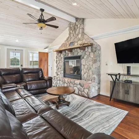 Lakefront Gladwin Vacation Rental With Deck And Dock!